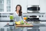 Blendtec Designer 725 Stainless with lady